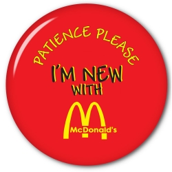 McDonalds 2.5" Promotional Pin back Button with "Patience Please - I'm New"n